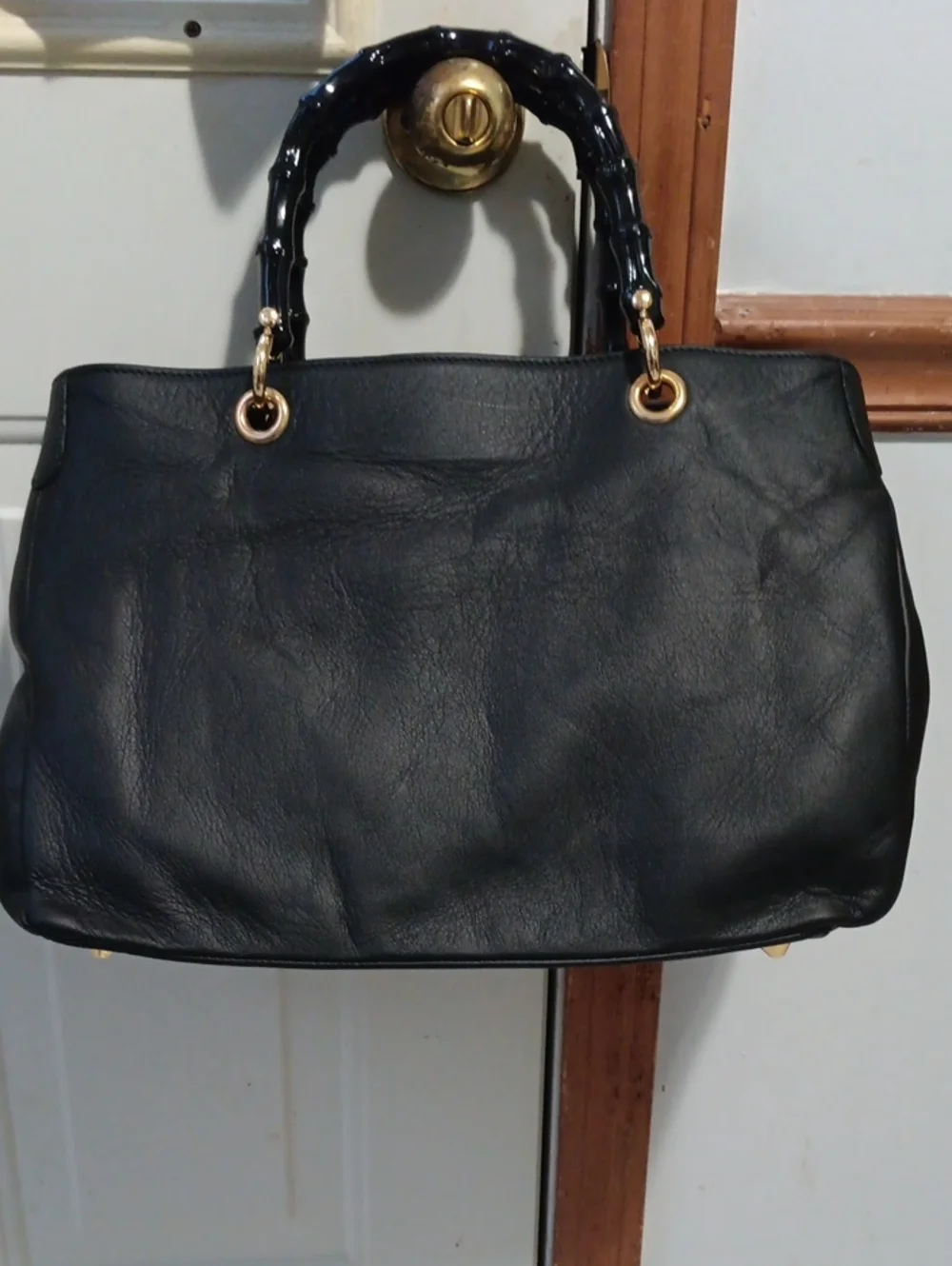 Classic Black Leather Tote Handbag with Gold Accents